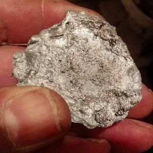 2.5 ounce white gold nugget Mali lady  18kt